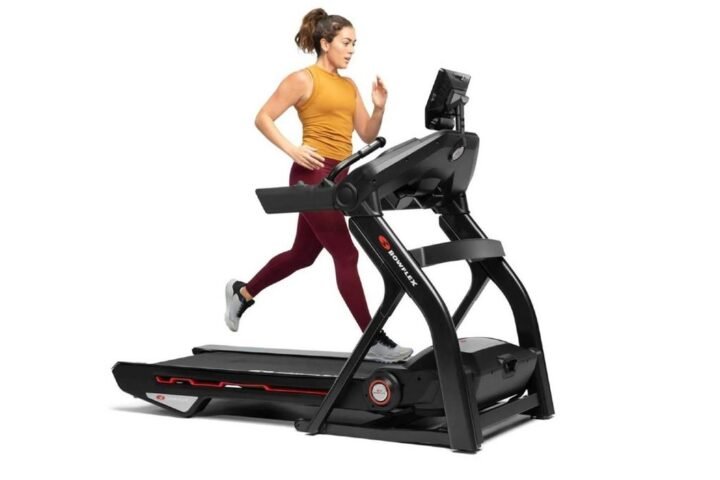 Woman running on Bowflex Treadmill 10