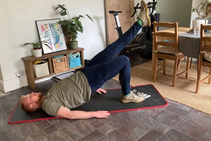 Man performing a bodyweight workout at home