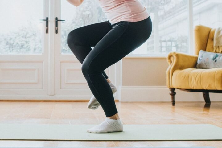 Woman balancing on one foot