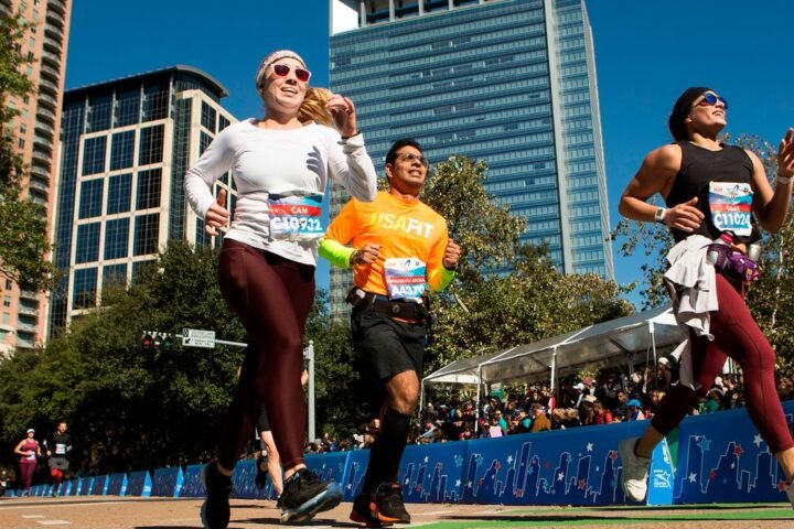 Runners approach the finish line of the Chevron Houston Marathon Sunday, Jan. 19, 2020 in Houston