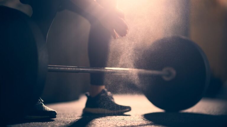 An athlete preparing to lift a barbell