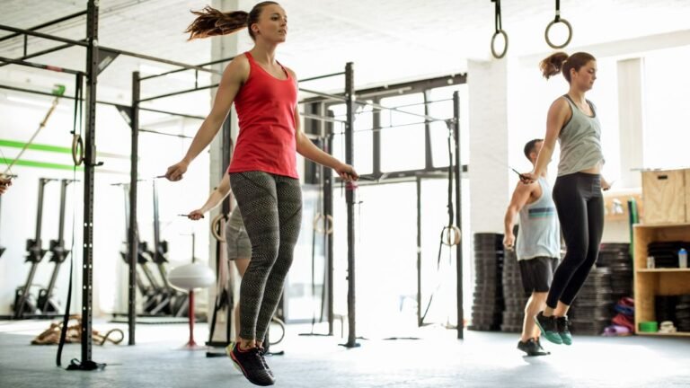 People in a CrossFit class completing double-unders