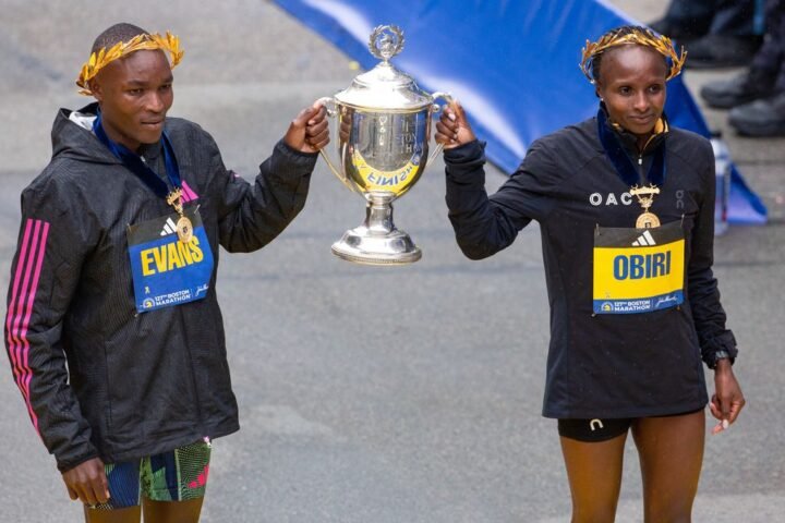 Boston Marathon 2023 winners Evans Chebet and Hellen Obiri hold the trophy together